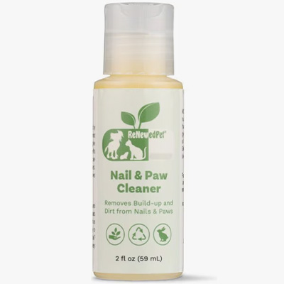 A small plastic bottle of RenewedPet Nail & Paw Cleaner with a flip-top cap. The label features green text and icons, stating it removes build-up and dirt from nails and paws, and includes eco-friendly and natural product symbols.