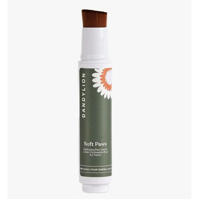 Dandylion Soft Paws Hydrating Dog Paw Lotion Cream Tall, slim bottle of Dandylion Soft Paws Hydrating Paw Lotion with a built-in brush applicator and dark green label featuring a daisy graphic. The text reads “Soft Paws – Hydrating Paw Lotion. Lotion hydratante pour les pattes,” and the product is made for dogs.