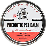 Metal tin of Skout’s Honor Prebiotic Pet Balm, featuring manuka honey, designed for daily preventative care to soothe and protect pet paws and noses.