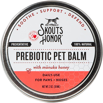 SKOUT'S HONOR Prebiotic Pet Balm Metal tin of Skout’s Honor Prebiotic Pet Balm, featuring manuka honey, designed for daily preventative care to soothe and protect pet paws and noses.