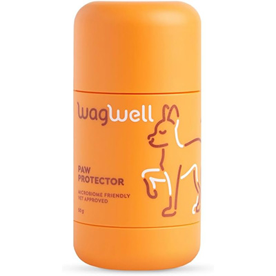 WagWell Paw Protector Bright orange cylindrical container of WagWell Paw Protector, featuring a minimalist outline of a dog lifting its paw. The label reads “WagWell Paw Protector – Microbiome Friendly, Vet Approved,” and the product size is 15g.